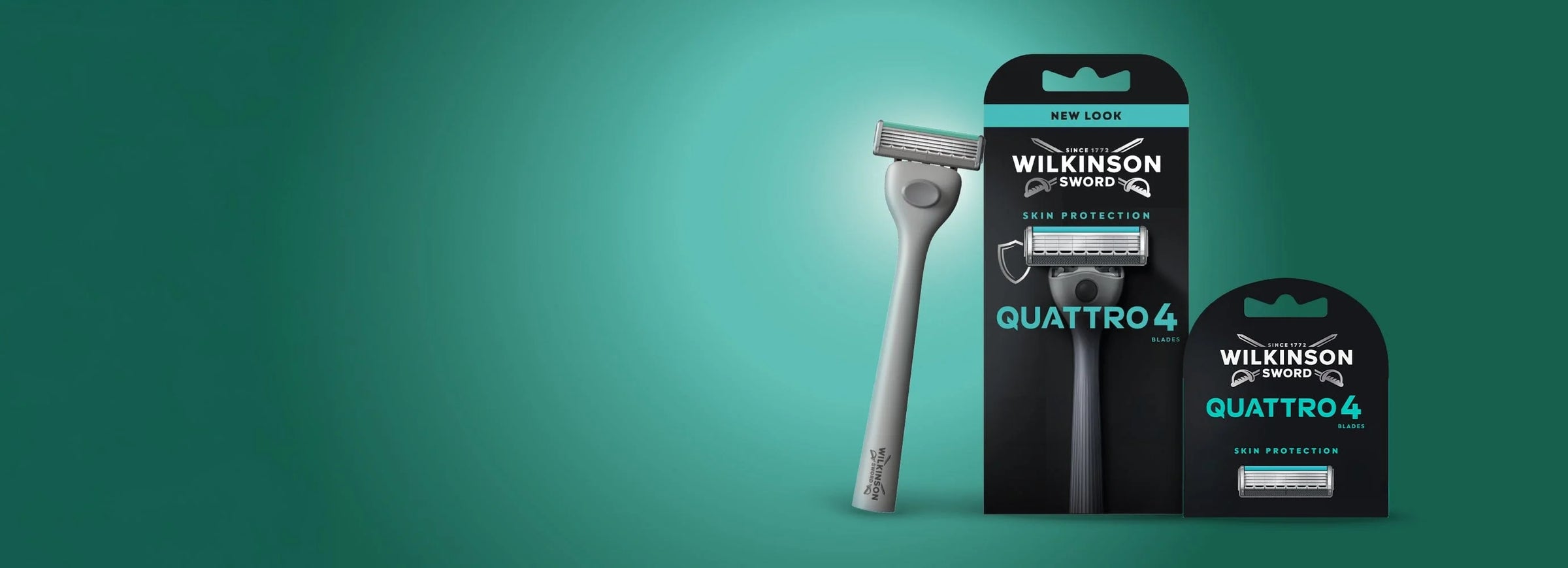 Wilkinson sword quatro 4 razor and razor heads in packaging on a green gradient background